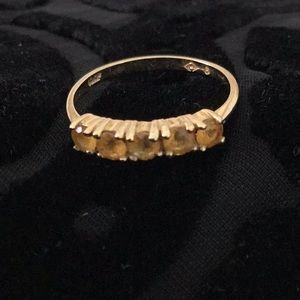 10K yellow gold ring with five dark citrine gemstones